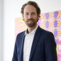 Tobias Otta, Geschäftsführer der Rietzler Energiekonzept, lächelt in die Kamera